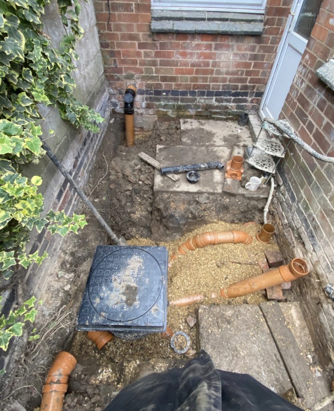 Manhole and foul drainage connections being installed